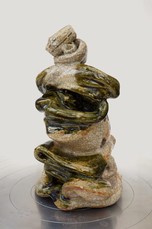 The Wheel-Thrower Man — stacked hand-built sculpture under a green Oribe glaze.