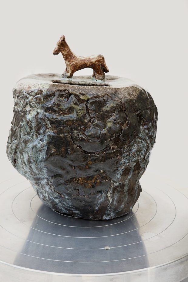 In Search Of Home — textured lidded jar topped with a small modelled horse.